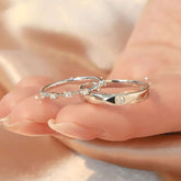 Matching minimalist diamond rings in 18K white gold, sparkling lab-grown diamonds on satin background.
